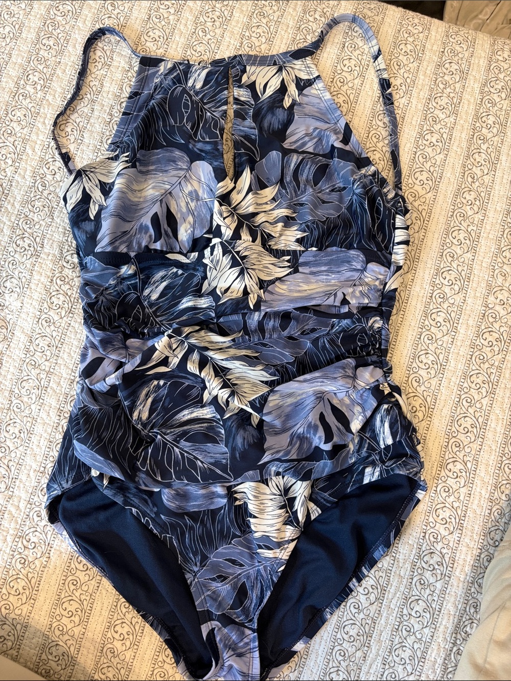 Women’s Blue Floral One-Piece Swimsuit Cinched at the waist.